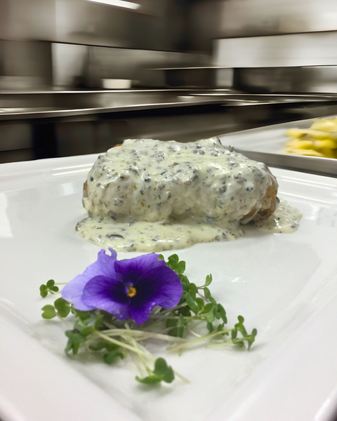Veal chop in black truffle sauce at Restaurant Radmilovac.