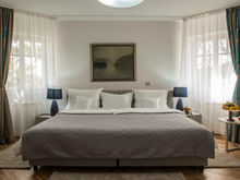 Deluxe room in the Radmilovac hotel with a spacious double bed and elegant decor