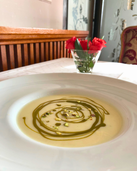 Creamy celery soup with pistachios served at Restaurant Radmilovac