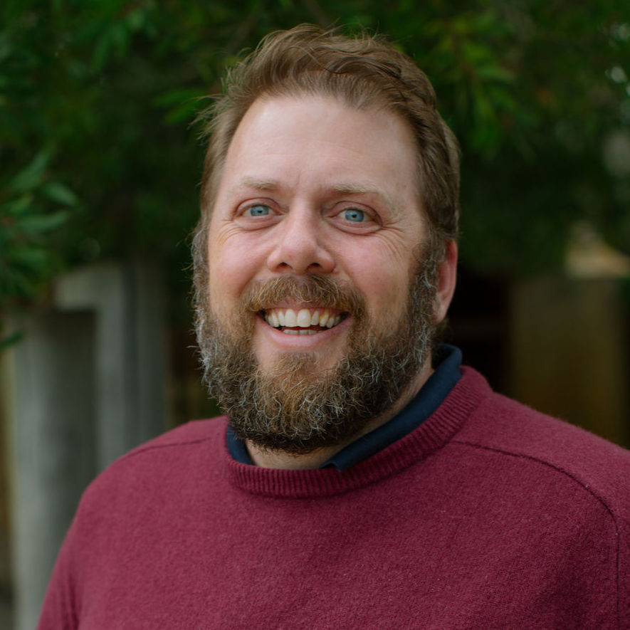 Hamish Fell, Board Member at Parklands School, smiling outside