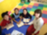 Kidspace - Niamh teaching reading.jpeg