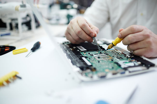 man-repairing-circuit-board-laptop.jpg