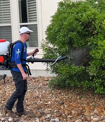 Ashton, Lead Tech, performing a Backpack Fogging