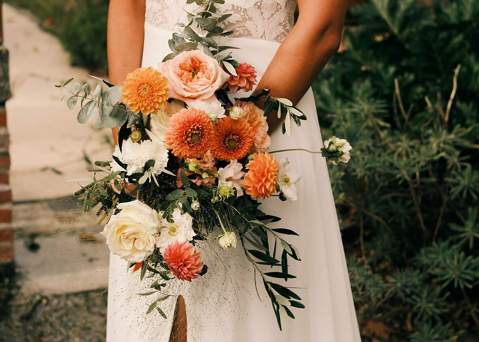 Bridal bouquet with autumn flowers and greenery
