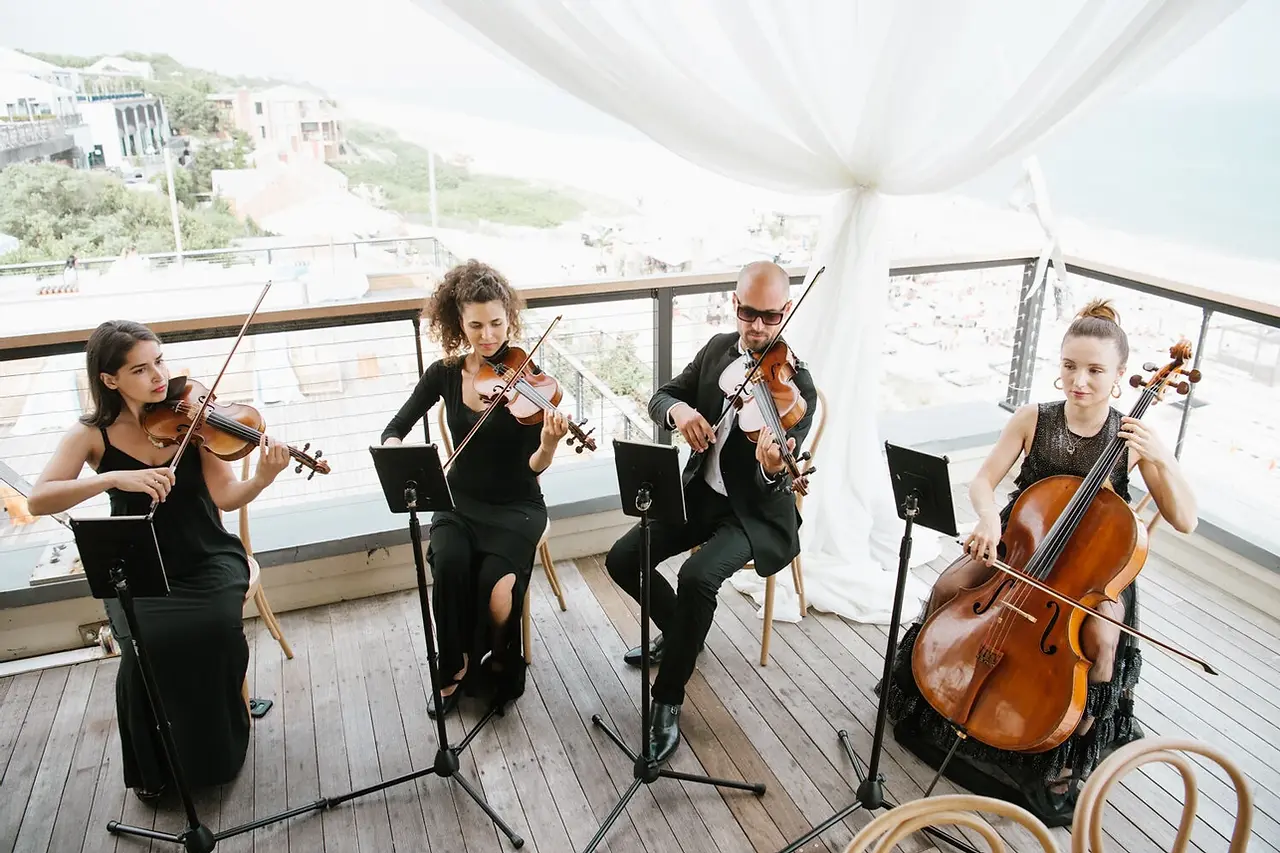 String quartet performing at a destination wedding