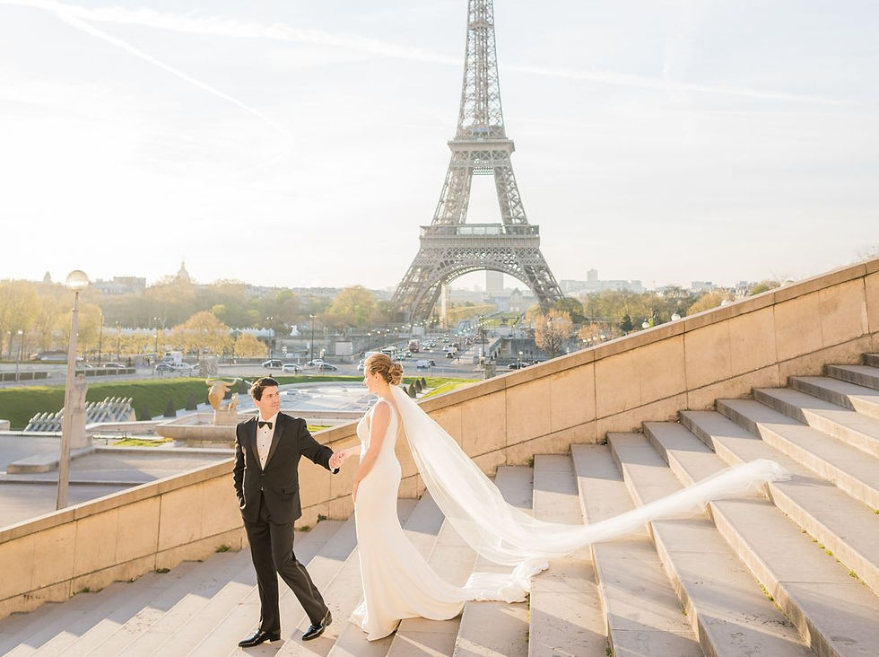 Newlyweds overlooking the Eiffel Tower in Paris