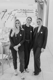 Wedding planning team posing together