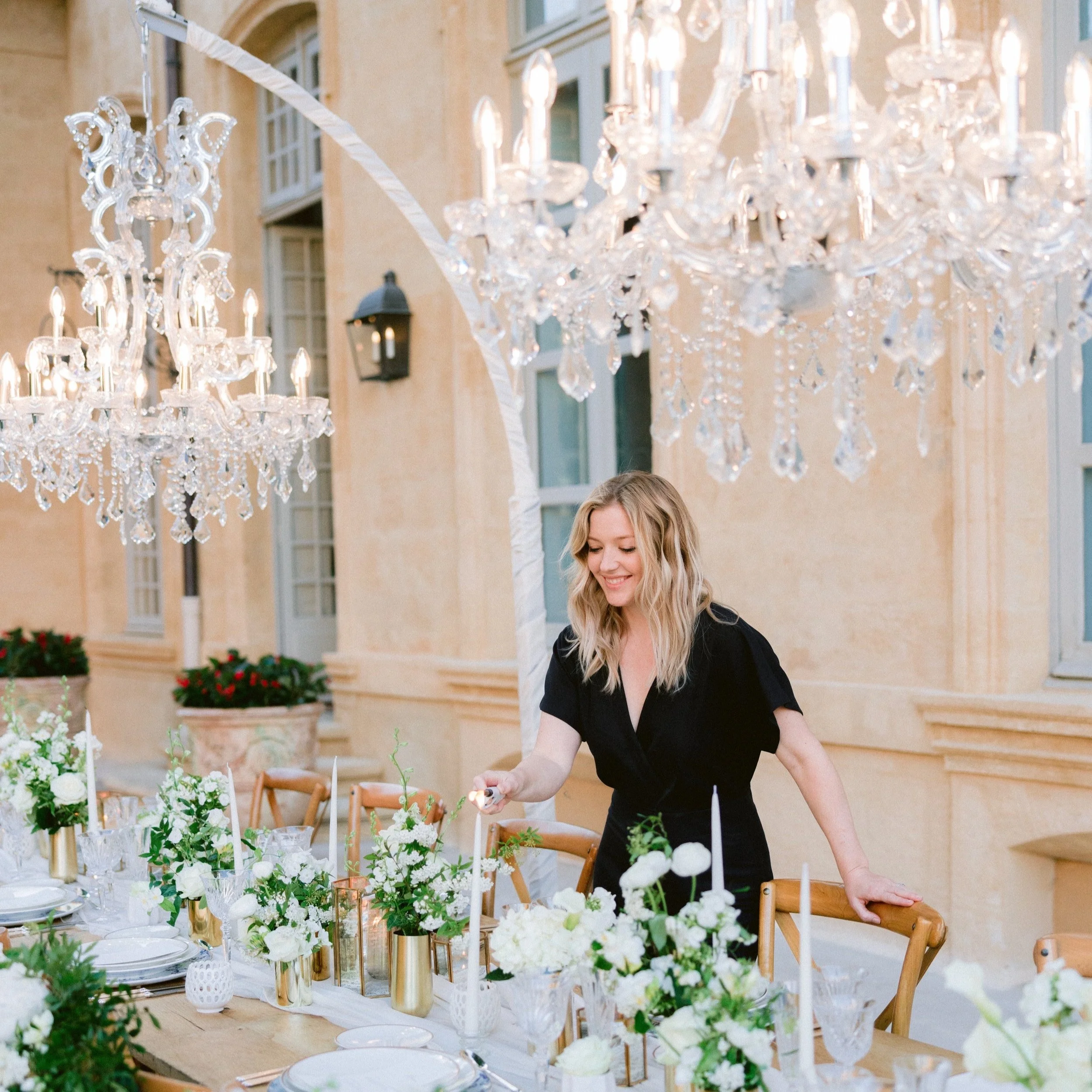 Wedding planner preparing an elegant reception table