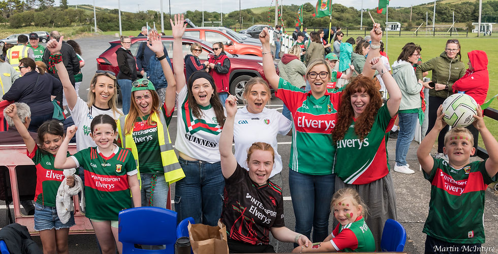 Kilmeena supporters await the arrival of the long-absent Sam Maguire 2026-07-31