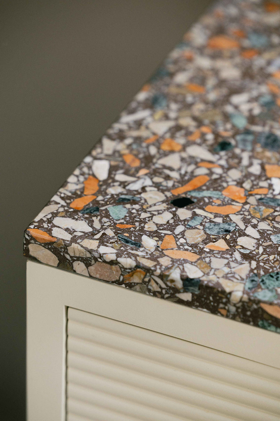 Close-up of bespoke terrazzo vanity surface and custom bathroom joinery by Kinder Design