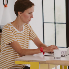 Kinder Design founder Leo Wood seated at her desk during The Anthropology of Space and Place course at City Lit, exploring how humans create meaning in architecture and interiors.