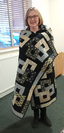 Claire with required shape of quilt