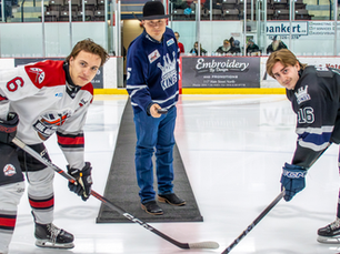 Brayden Byrne drops the puck at the center ice