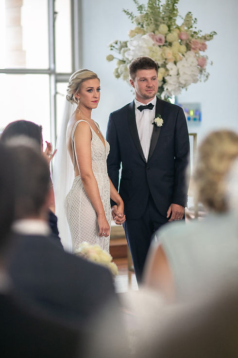Bride and groom at the wedding ceremony at HMAS Watson Chapel. Wedding photography by best Sydney wedding photographer, Grant Hoskinson Photography.
