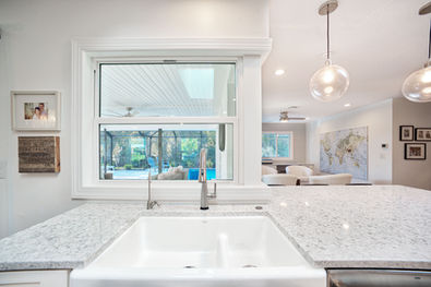 Custom kitchen remodel with large island and pendant lighting in Venice, FL