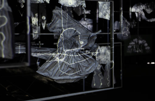 Samuel James, PANIC_ EMBRACE, 2022, 4K video mapped onto clothing fragments. Supported by