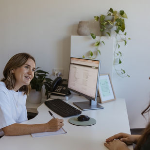 A LifeHouse Community Care case worker meets with a client to provide crisis relief in Coffs Harbour