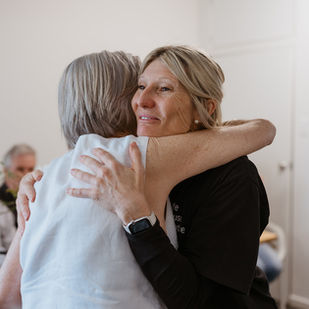 Two ladies hugging with gratitude