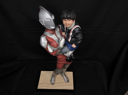 Child Holding Ultraman