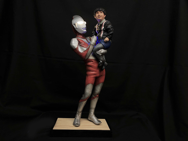 Child Holding Ultraman