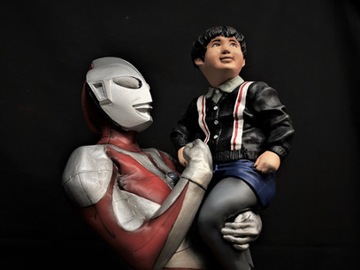 Child Holding Ultraman
