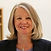 Woman Smiling in Suit
