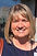 Woman Smiling in Suit