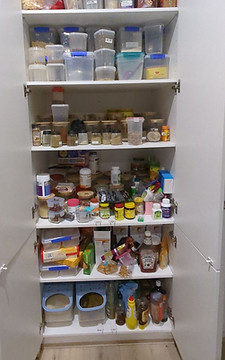 Cluttered pantry shelves