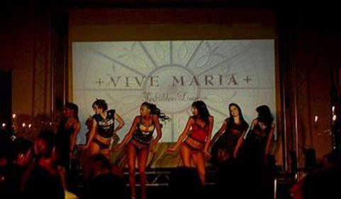 female Artists on stage performing for a Fashion Show