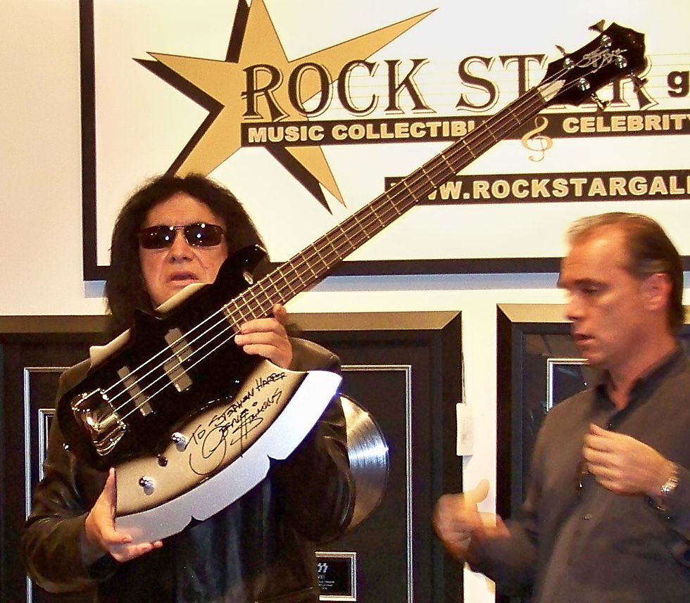 Gene signed Stephen Harpers axe Bass guitar