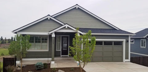 2 story house on a hill