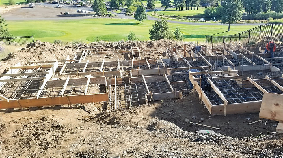 Wide angle view of a residential lot with varied terrain