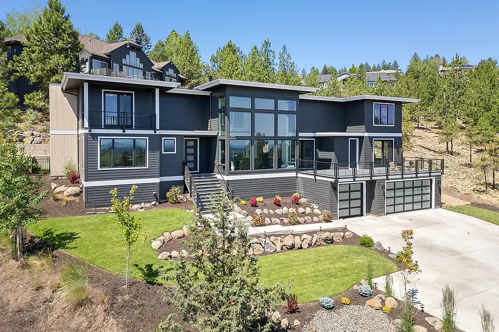 Eye-level view of a modern home with a landscaped garden