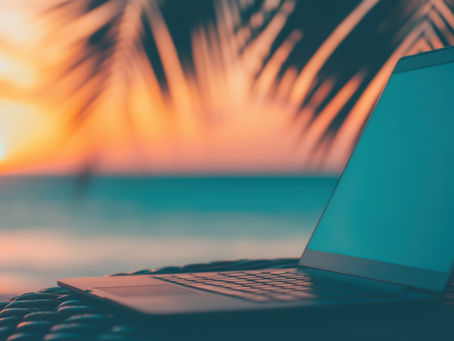 Laptop in front of sunset