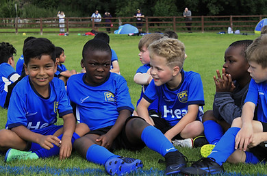 Young children taking part in CPS Little Ones football training in Bolton, developing coordination, confidence, movement skills, and basic football techniques in a fun and supportive environment.