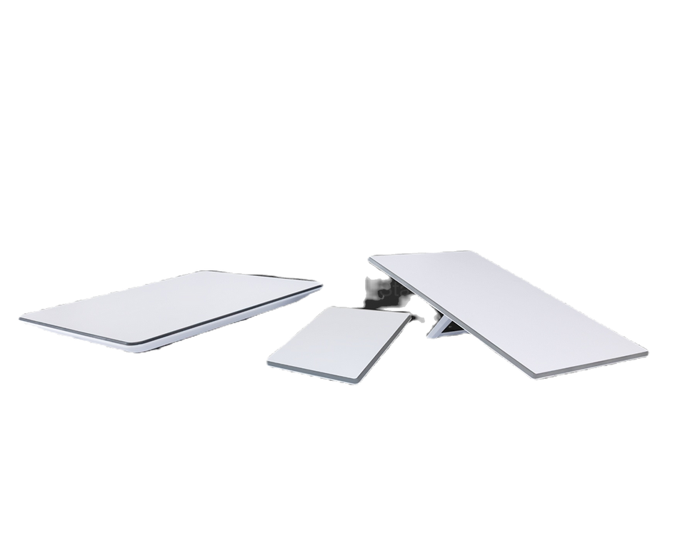 Three white computer processor chips with visible pins on black background.