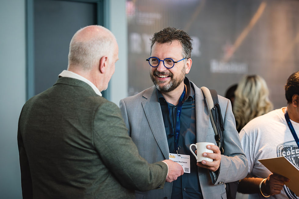 Delegate networking photographed at Aqua Enviro conference in Manchester