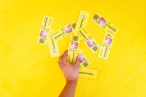 VoucherCodes PR activation photography showing branded campaign vouchers