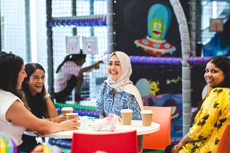 Guests chatting at a children’s birthday party venue
