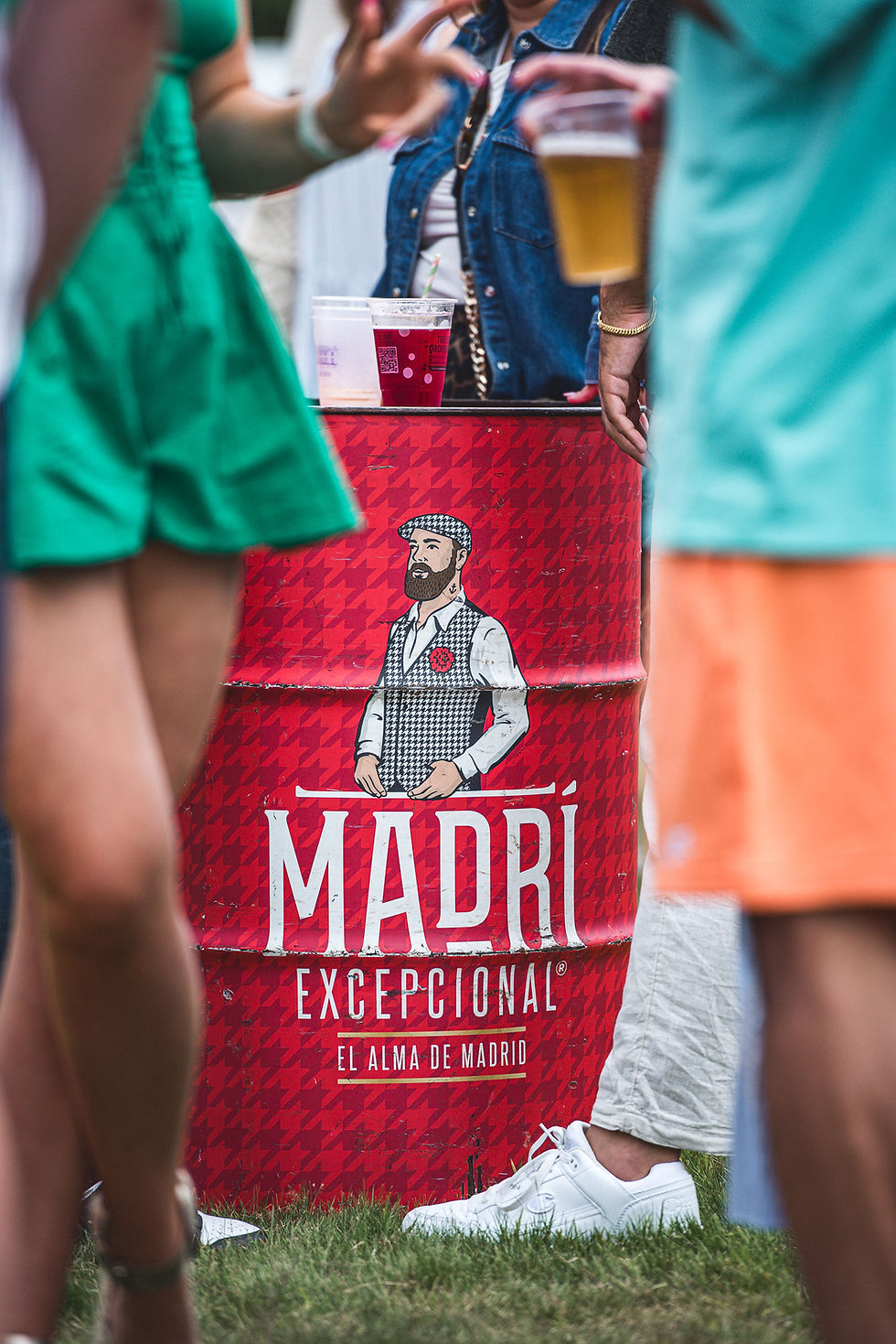 Red Madri beer barrel photographed between festival visitors at Himley Hall