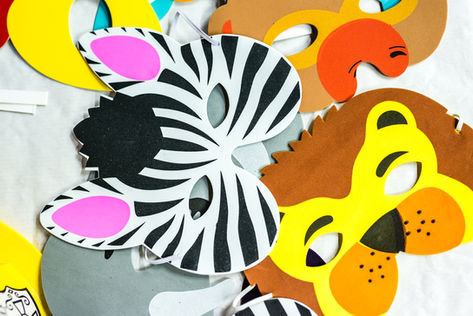 Animal masks and party decorations at a children’s birthday party