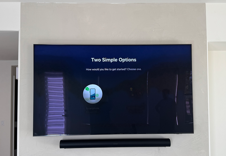 tv-mounted-on-wall-with-sonos-soundbar