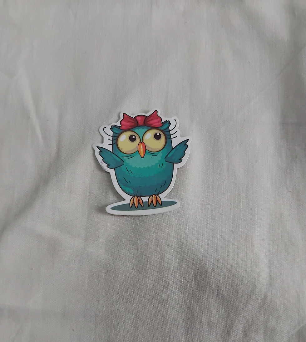 Sticker cut out of an owl with a large red hair bow