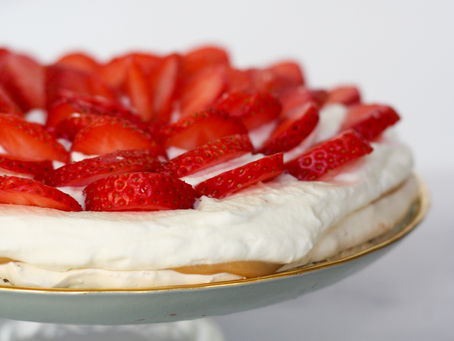 Almond Pavlova Cake with Dulce de Leche, Whipped Cream & Strawberries
