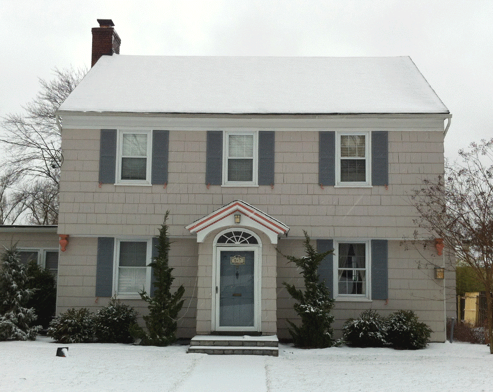Window Cartoon Silhouettes (backlit vinyl window posters) transform this house when seen at night.
