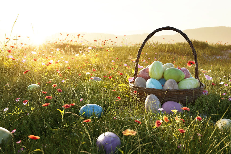 a basket filled with colorful eggs sitting upon a field filled with flowers and sunlight