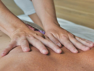 pair of hands on back