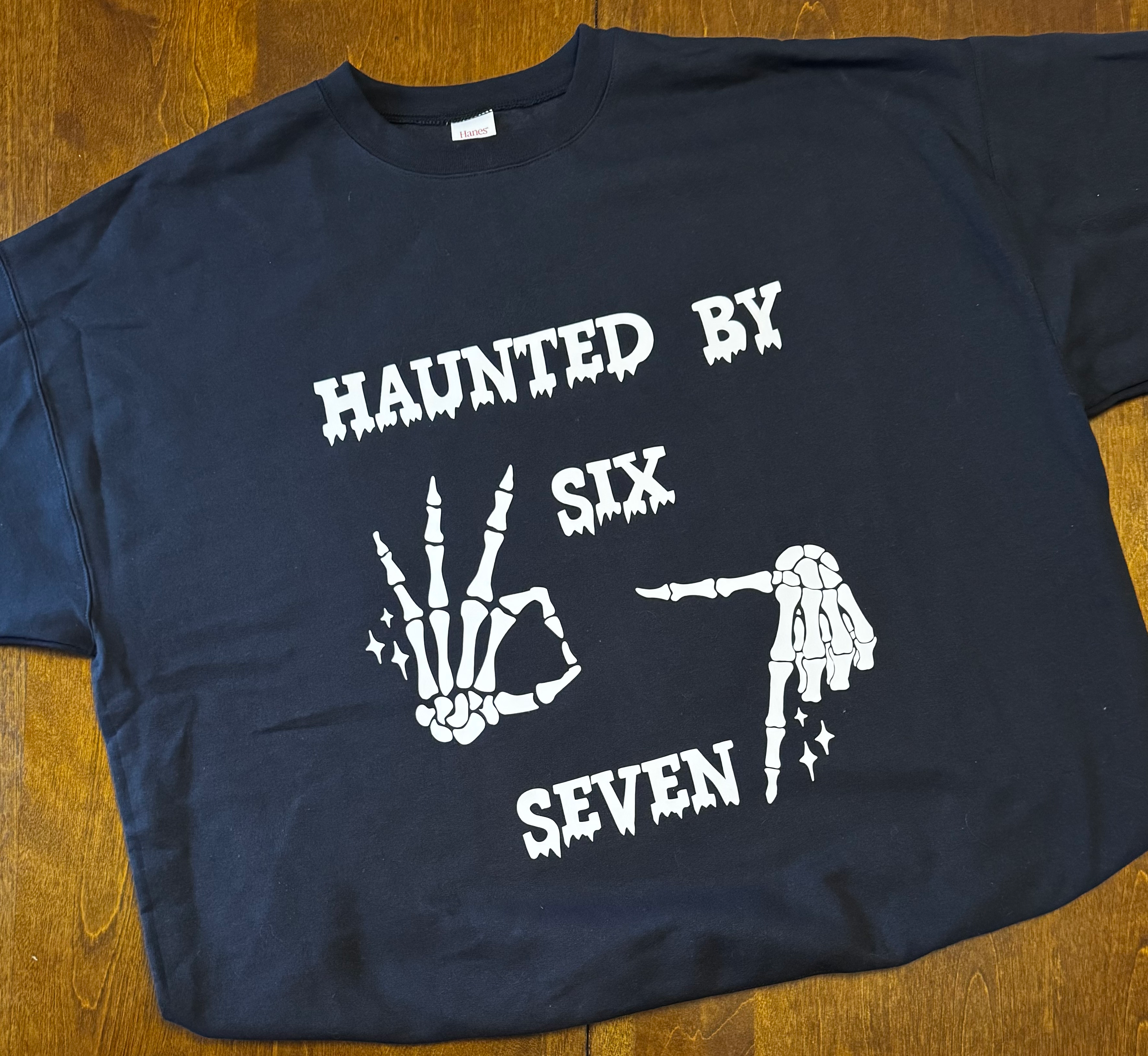 Haunted by "6, 7" Tee