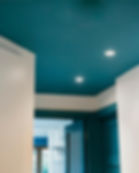 Teal painted ceiling and door details in a contemporary Fulham apartment