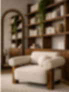Luxury reading corner with sculptural boucle armchair, bespoke dark wood joinery and neutral textured rug.